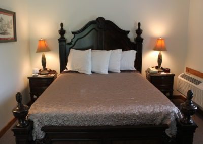 Our charming accommodations and hotel rooms offer antique furniture and premium linens.